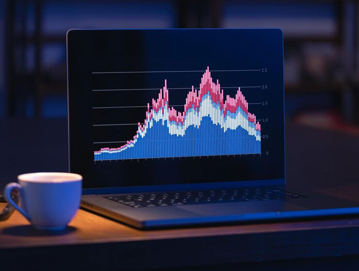 computer-dark-room-with-graphs-screen_169016-48771