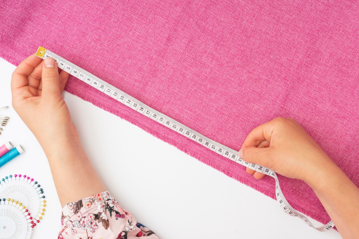 top-view-tailor-working-fabric_23-2148586746