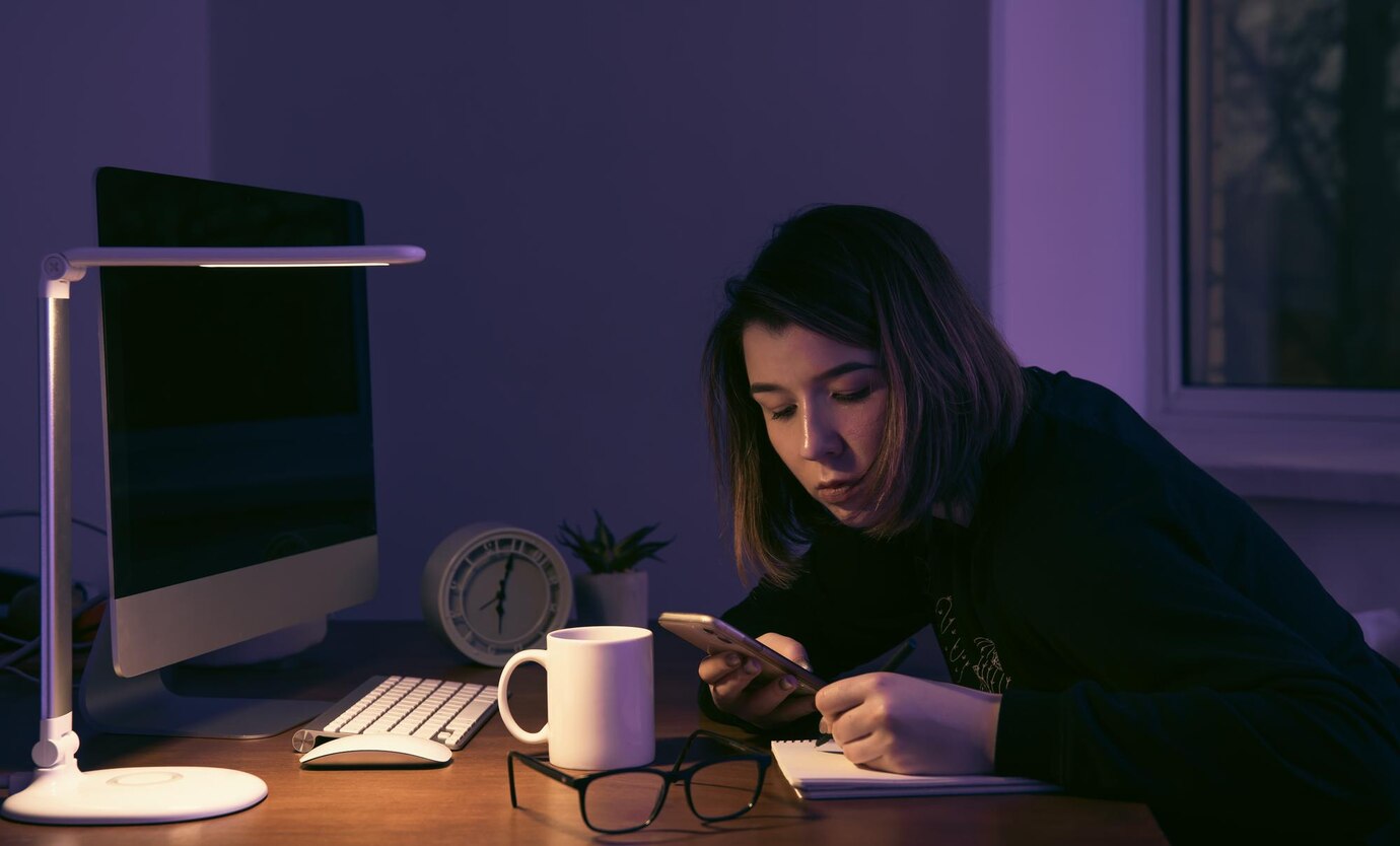 young-woman-working-night-workplace_169016-18002