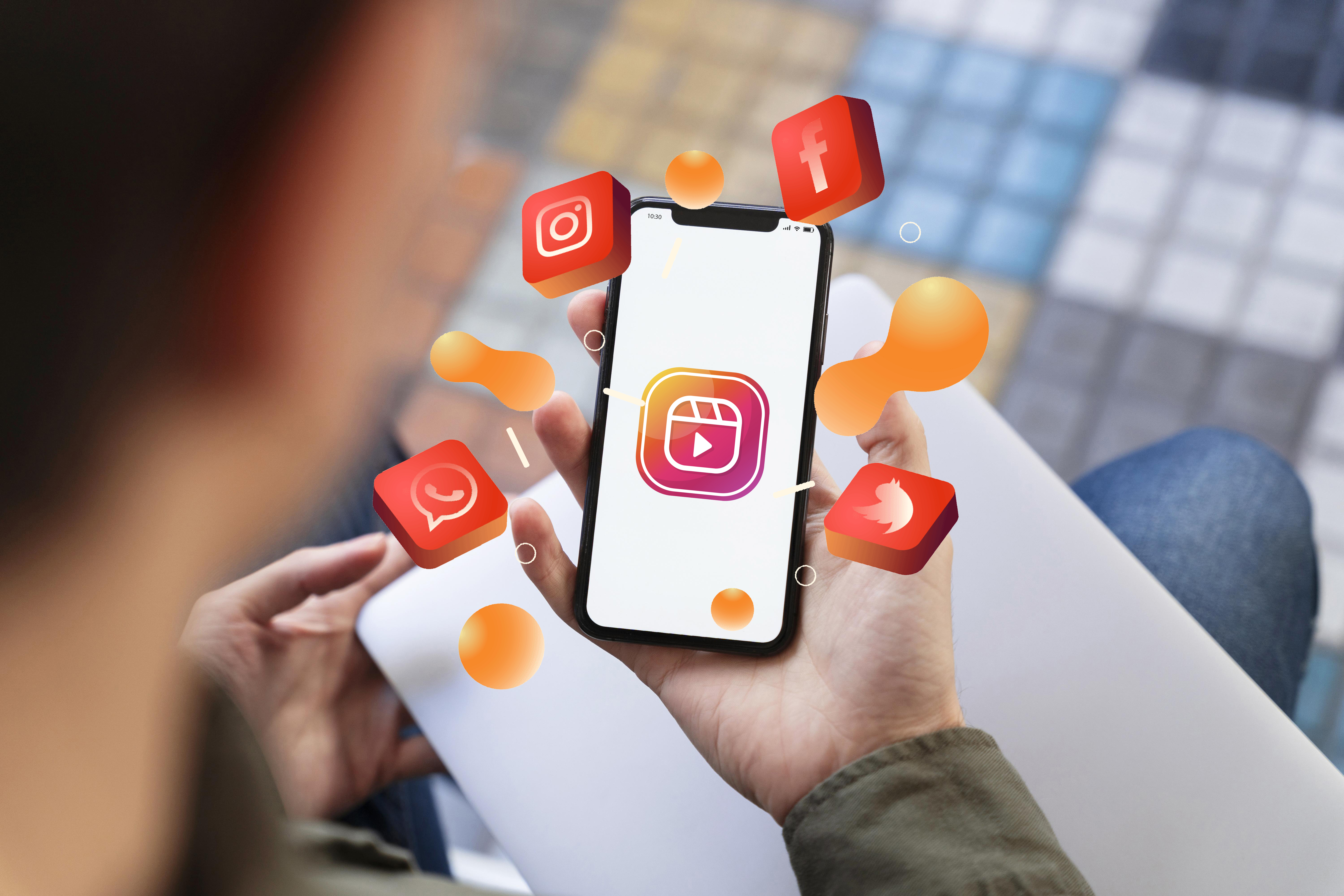hand-holding-smartphone-social-media-concept